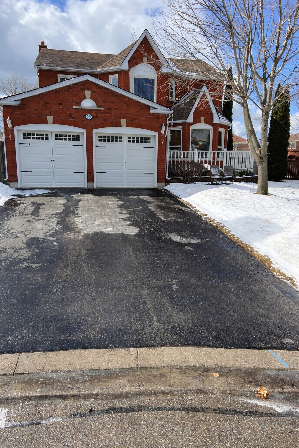 Exterior before photo of garage conversion ADU project in Clarington, Ontario